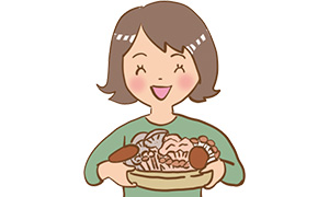 キノコを持つ女性